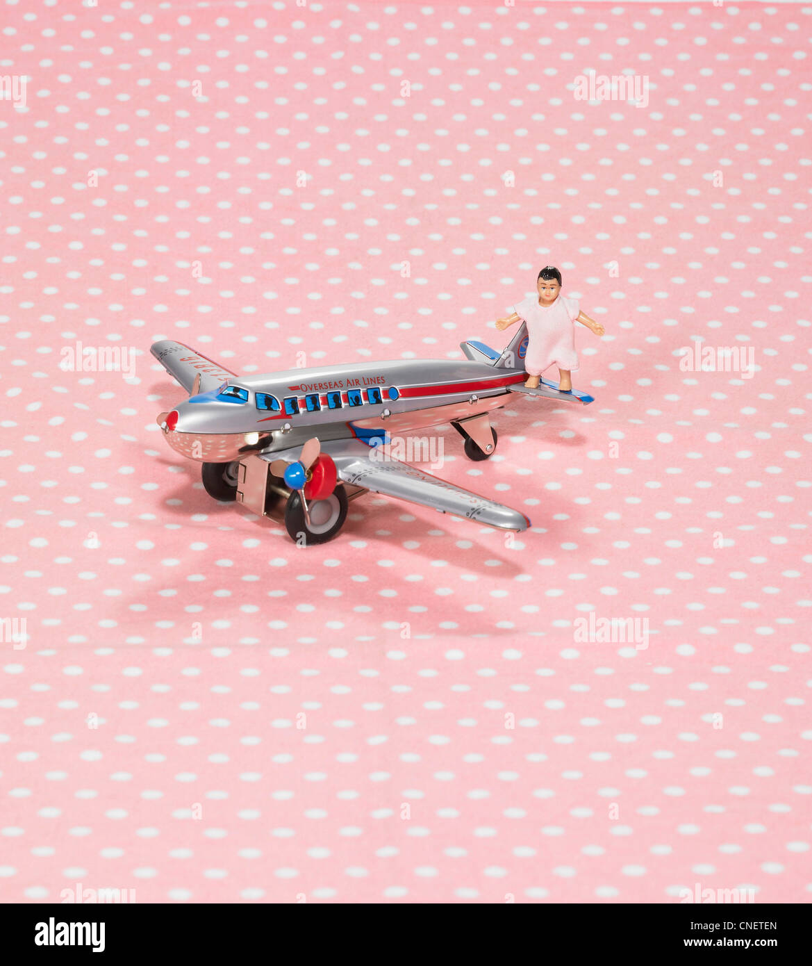 Baby Doll on Toy Airplane Stock Photo Alamy