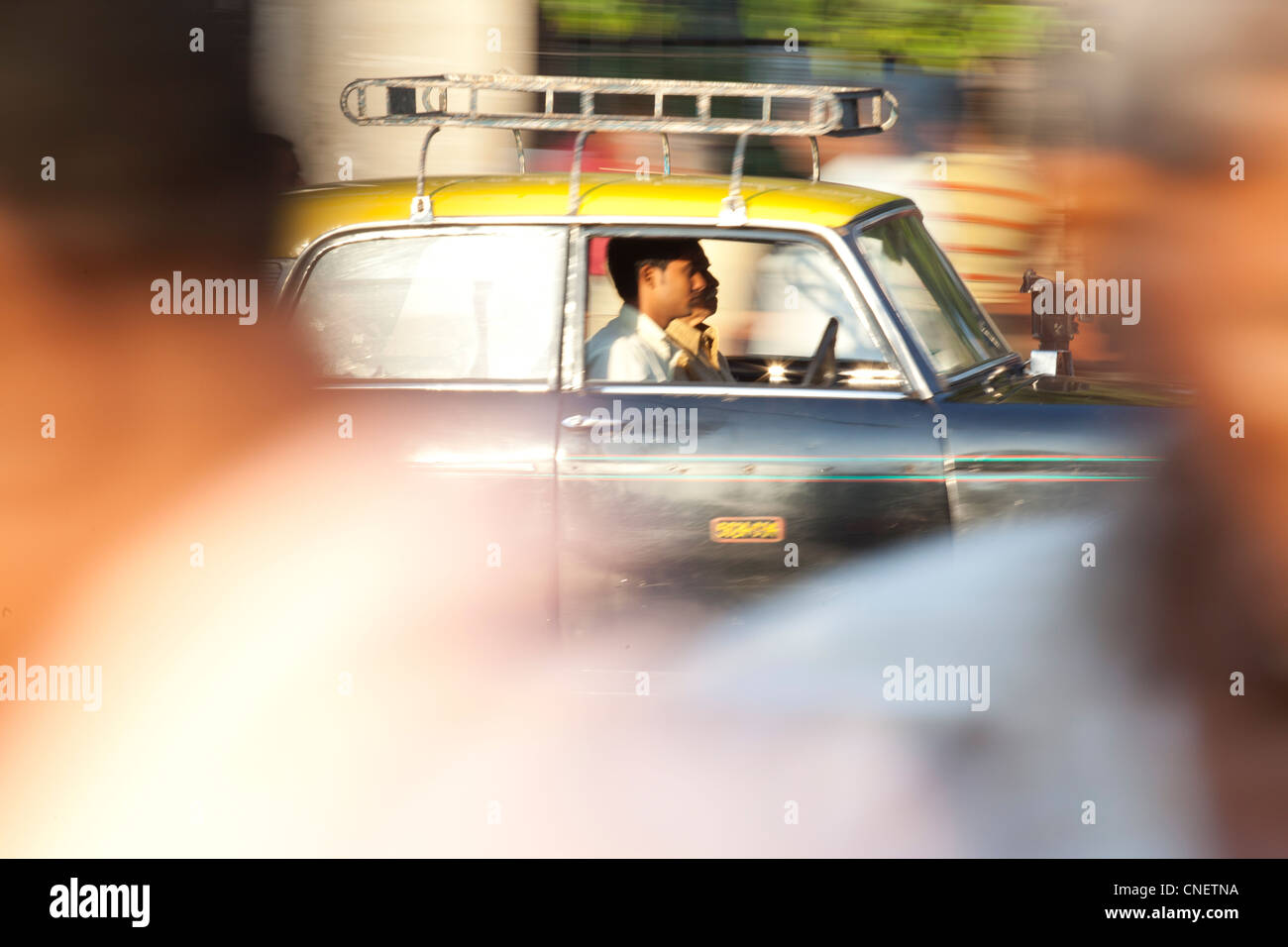 India, Mumbai, local taxi, panned. Stock Photo