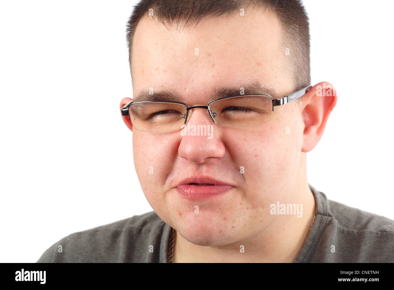 Obese man thoughtful portrait photo on the white background Stock Photo