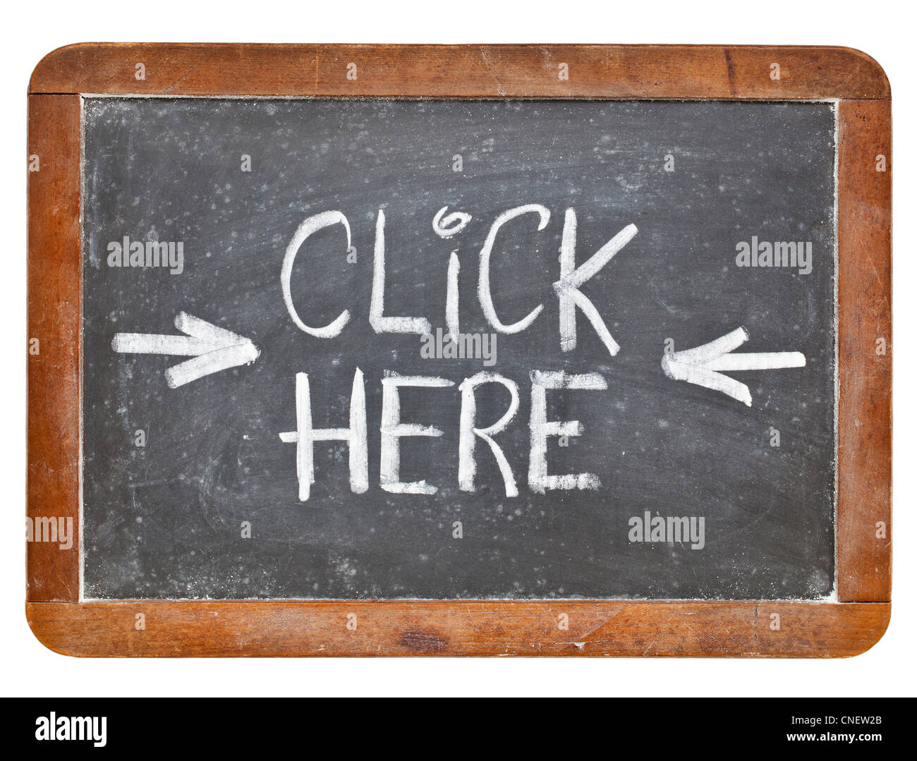 click here - white chalk handwriting on a vintage slate blackboard, isolated Stock Photo