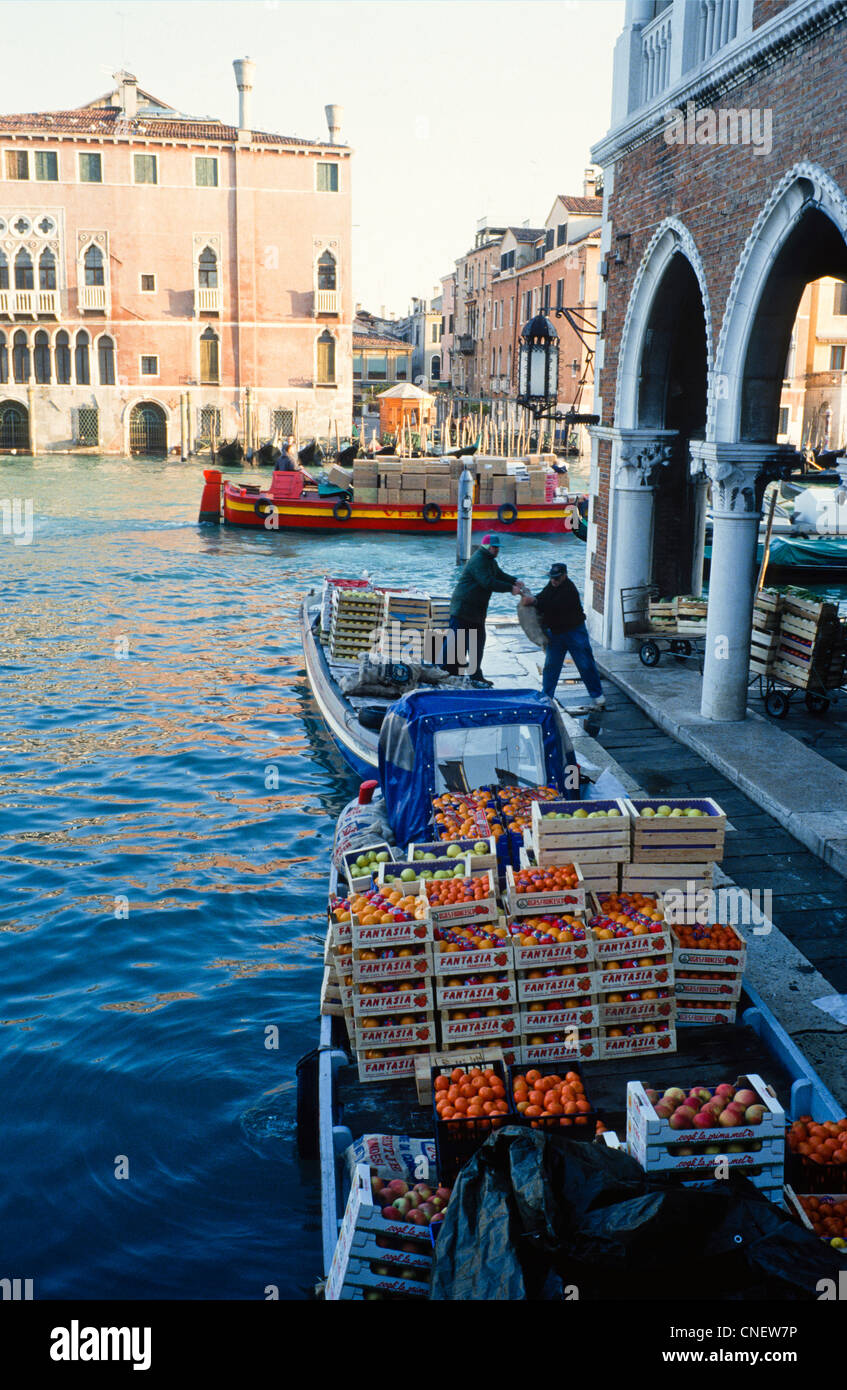 Due to a lack of roads and road transport barges are used as the main method of carriage on the Venetian canal system. Stock Photo