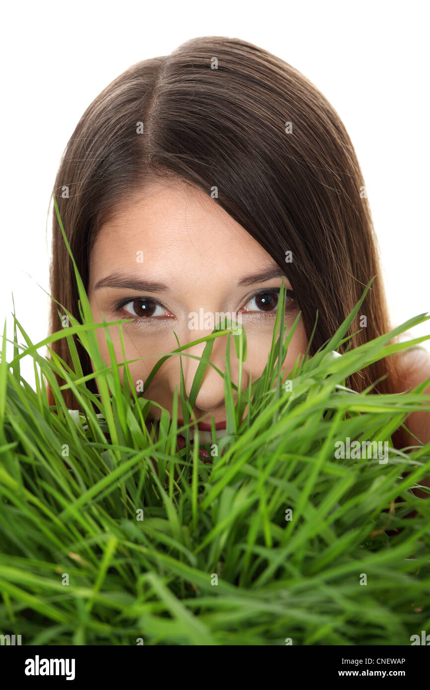 Beautiful young woman relaxing in the grass Stock Photo - Alamy