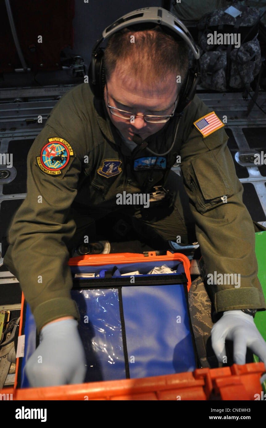 Looks for medical supplies during training flight c 130 cargo plane hires stock photography and
