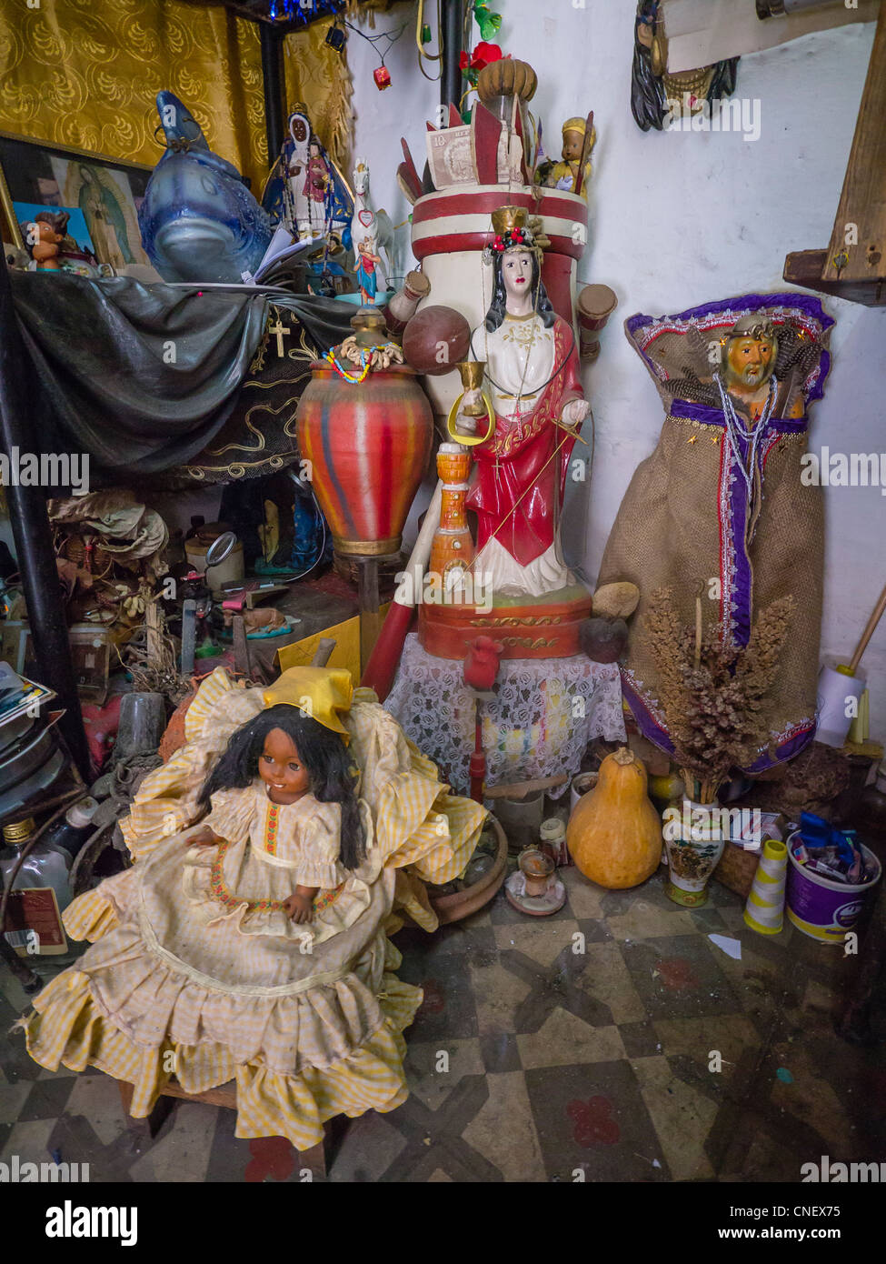 Ceramic and wood figures as well as other symbols collected as part of