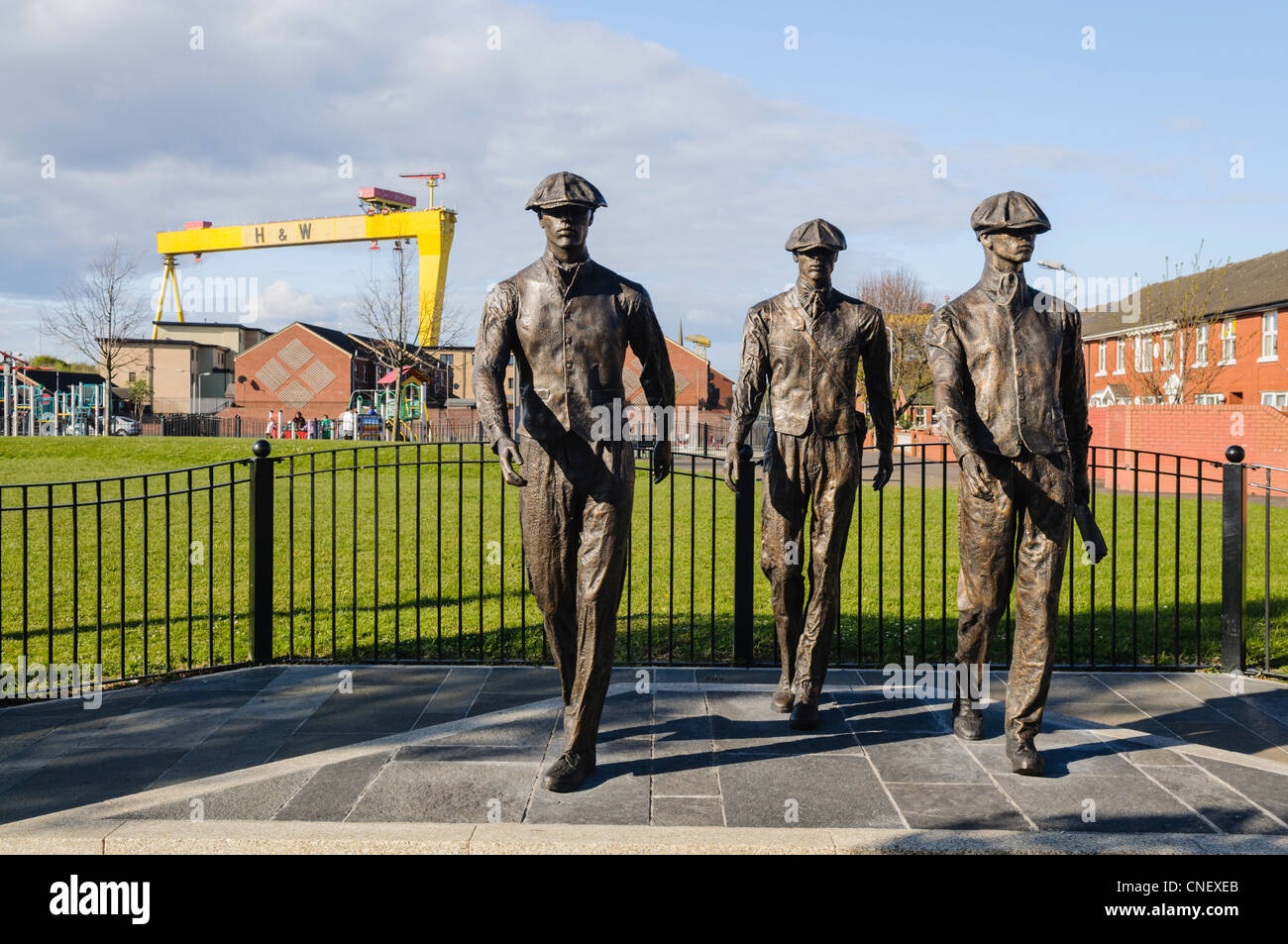 Yardmen statues to commemorate the men who worked in the Harland and Wolff shipyard. Artist: Ross Wilson.ctor Stock Photo