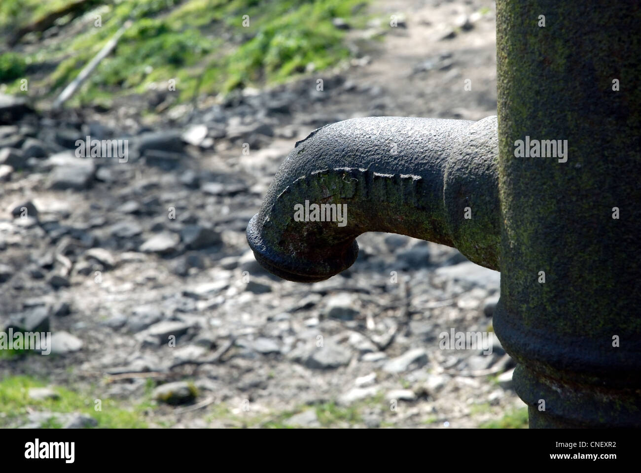 A stand pipe by a dried up stream Stock Photo Alamy