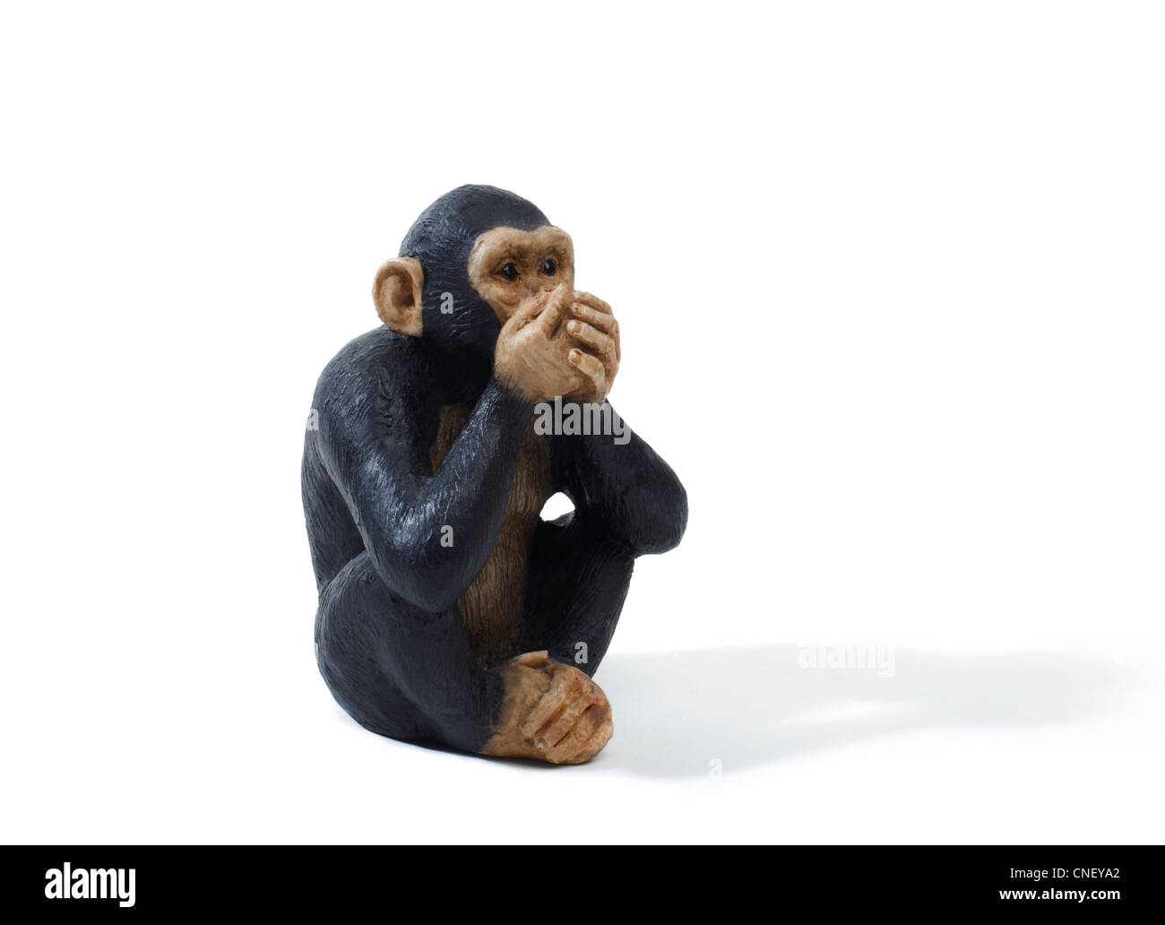 Studio shot of a toy monkey. speak no evil Stock Photo