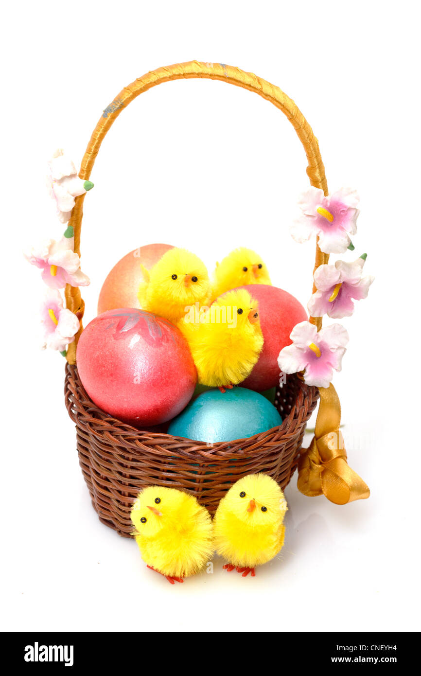 Basket with Easter Eggs on white background Stock Photo - Alamy