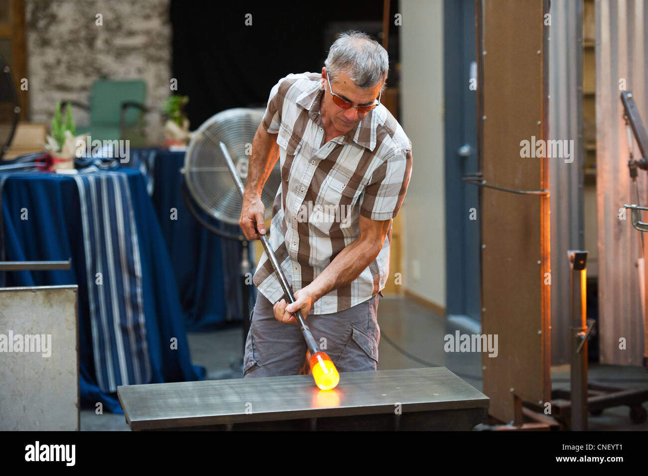 Man giving glass blowing demonstration Stock Photo Alamy