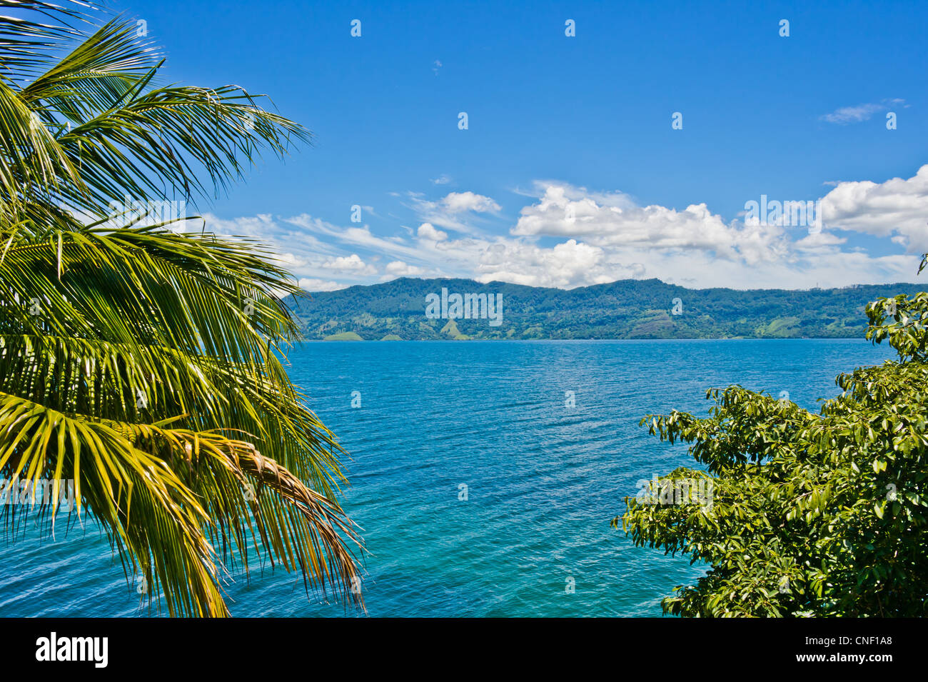 View of Lake Toba in Sumatra, Indonesia, Southeast Asia. It is the largest and deepest volcanic crater lake in the world. Stock Photo