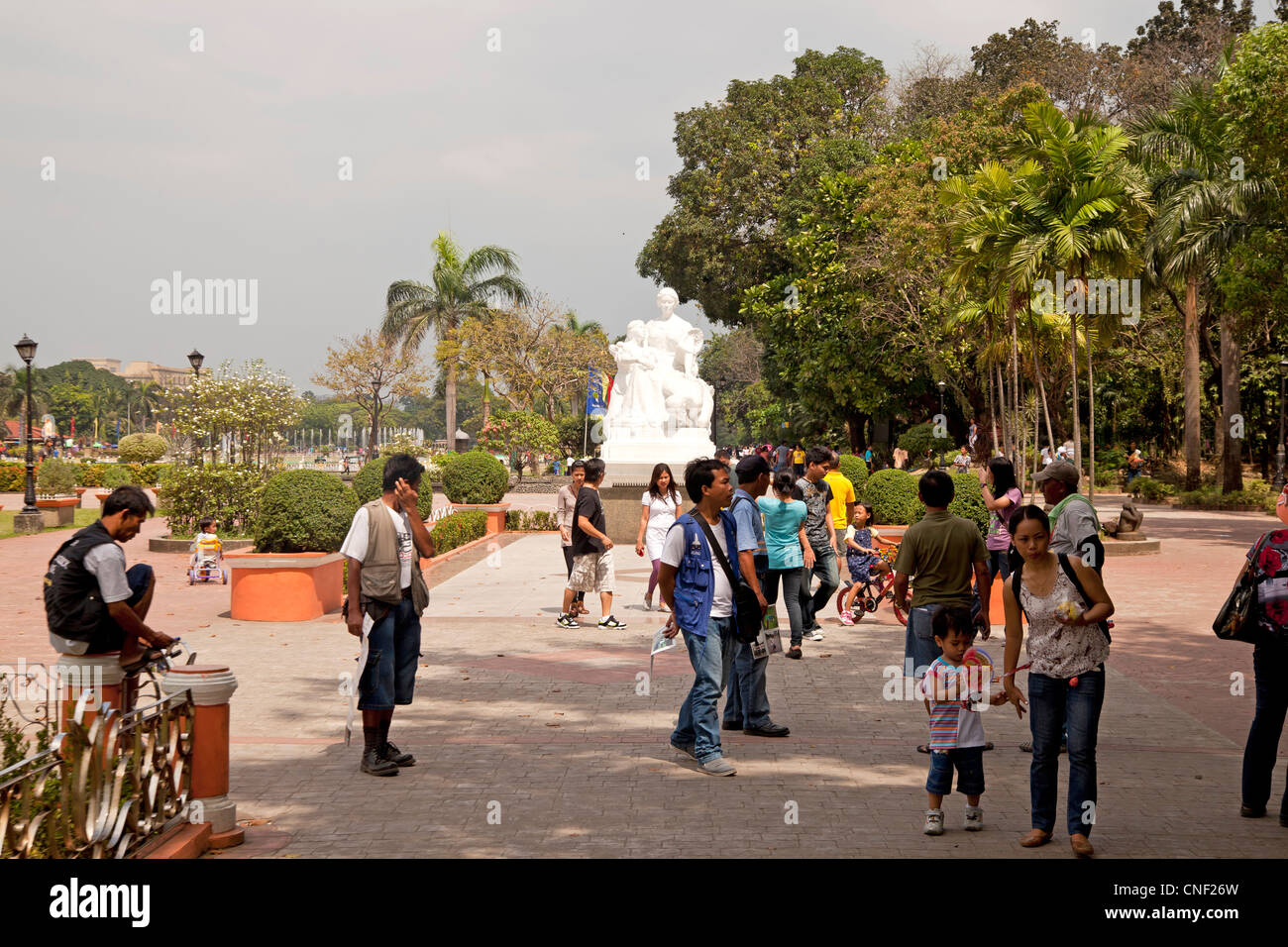 people and statues at Rizal Park Manila, Philippines, Asia Stock Photo