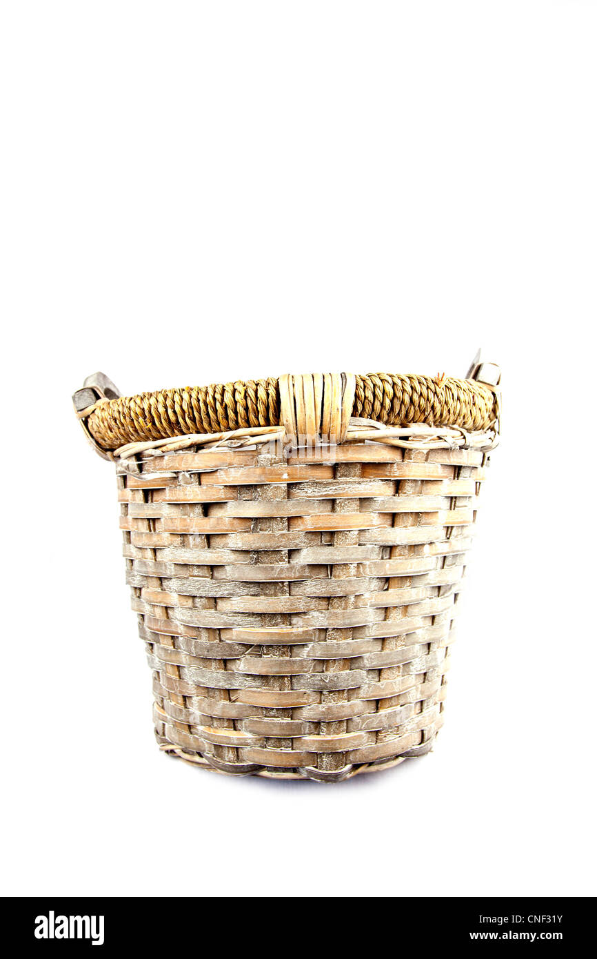 Old basket made of reed isolated on white background Stock Photo Alamy
