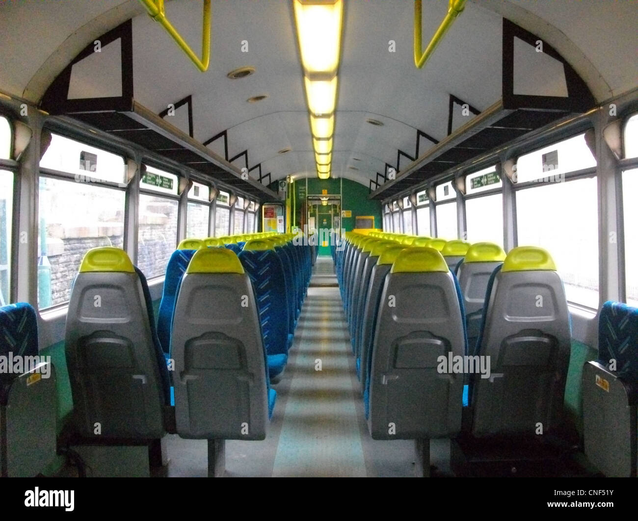The interior of a recently refreshed Arriva Trains Wales Class 143 - showing retrimmed seats in Arriva moquette Stock Photo