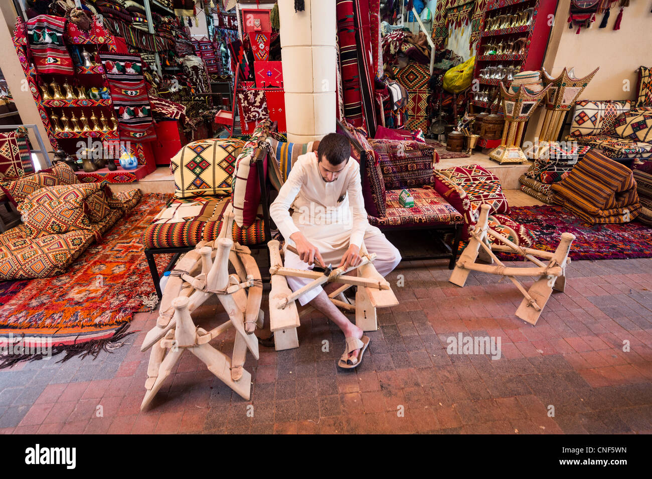 craftsman making camel saddle, Souq al-Thumairi, al-Dira, Riyadh, Saudi Arabia Stock Photo