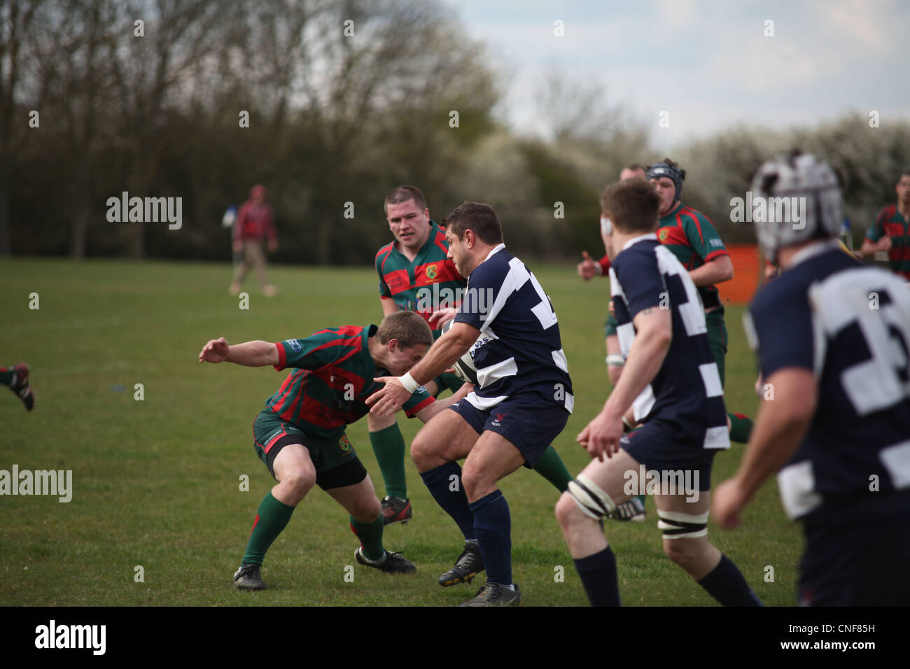 Paviors rugby player tackles a Leighton Buzzard player with ball Stock Photo