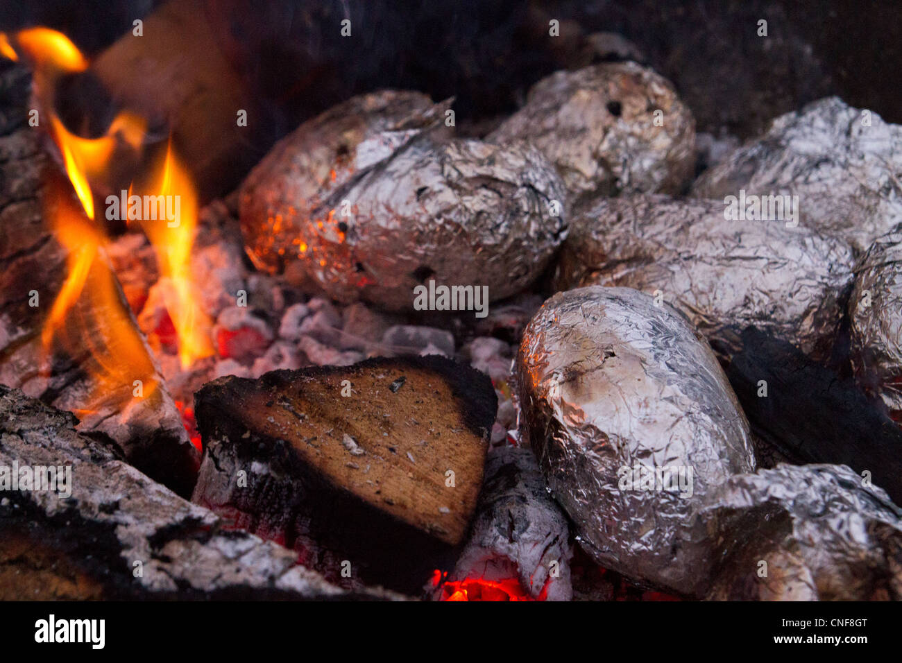 Jacket potato on a fire hires stock photography and images Alamy