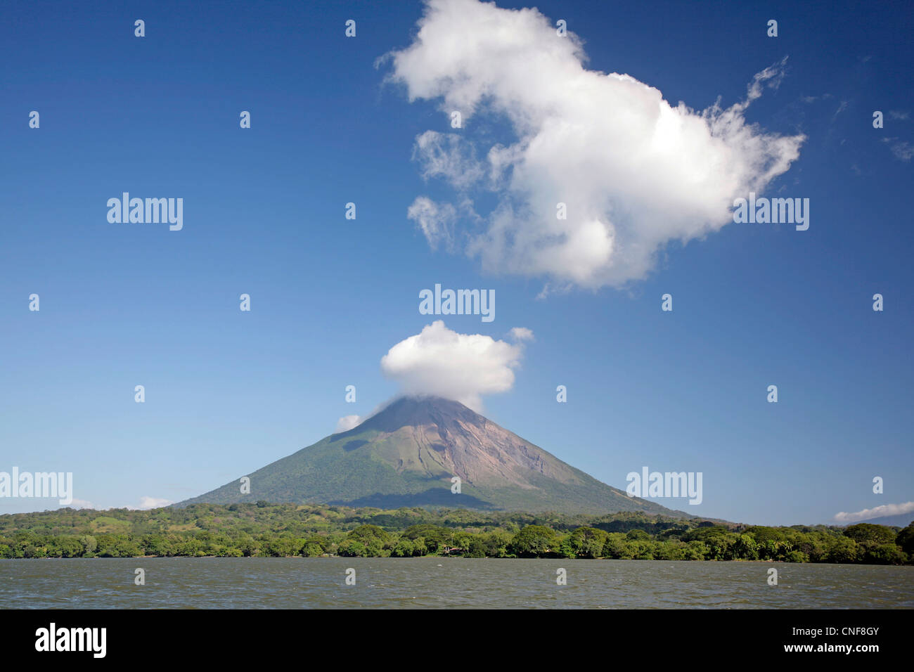 Volcano Conception vulcano Concepciòn Nicaragua Isla Ometepe island on Lake Nicaragua  puffing clouds on bright sunny day Stock Photo
