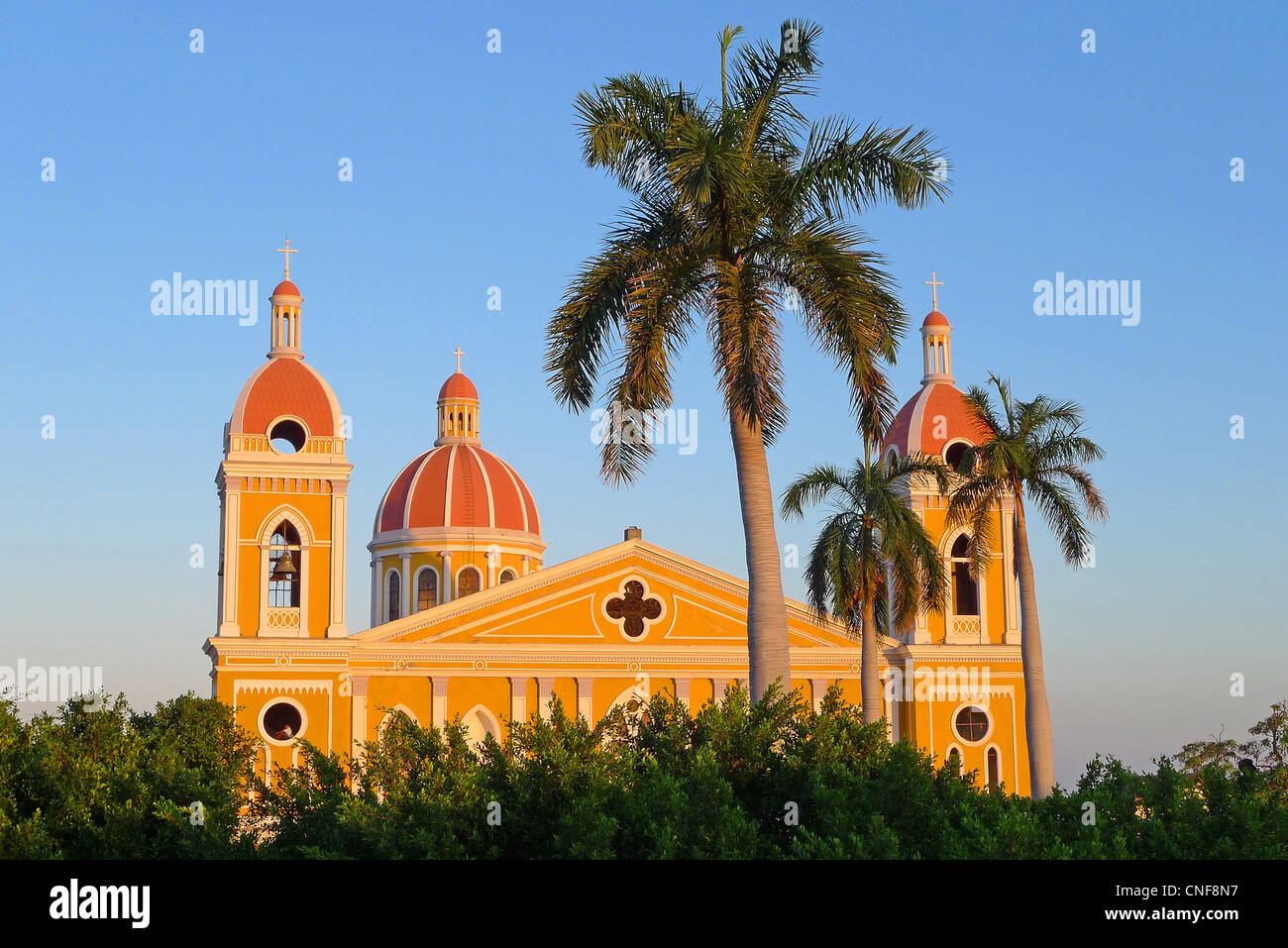 Colonial Cathedral of Granada Nicaragua at colorful sunset blue sky evening UNESCO World Heritage site Stock Photo