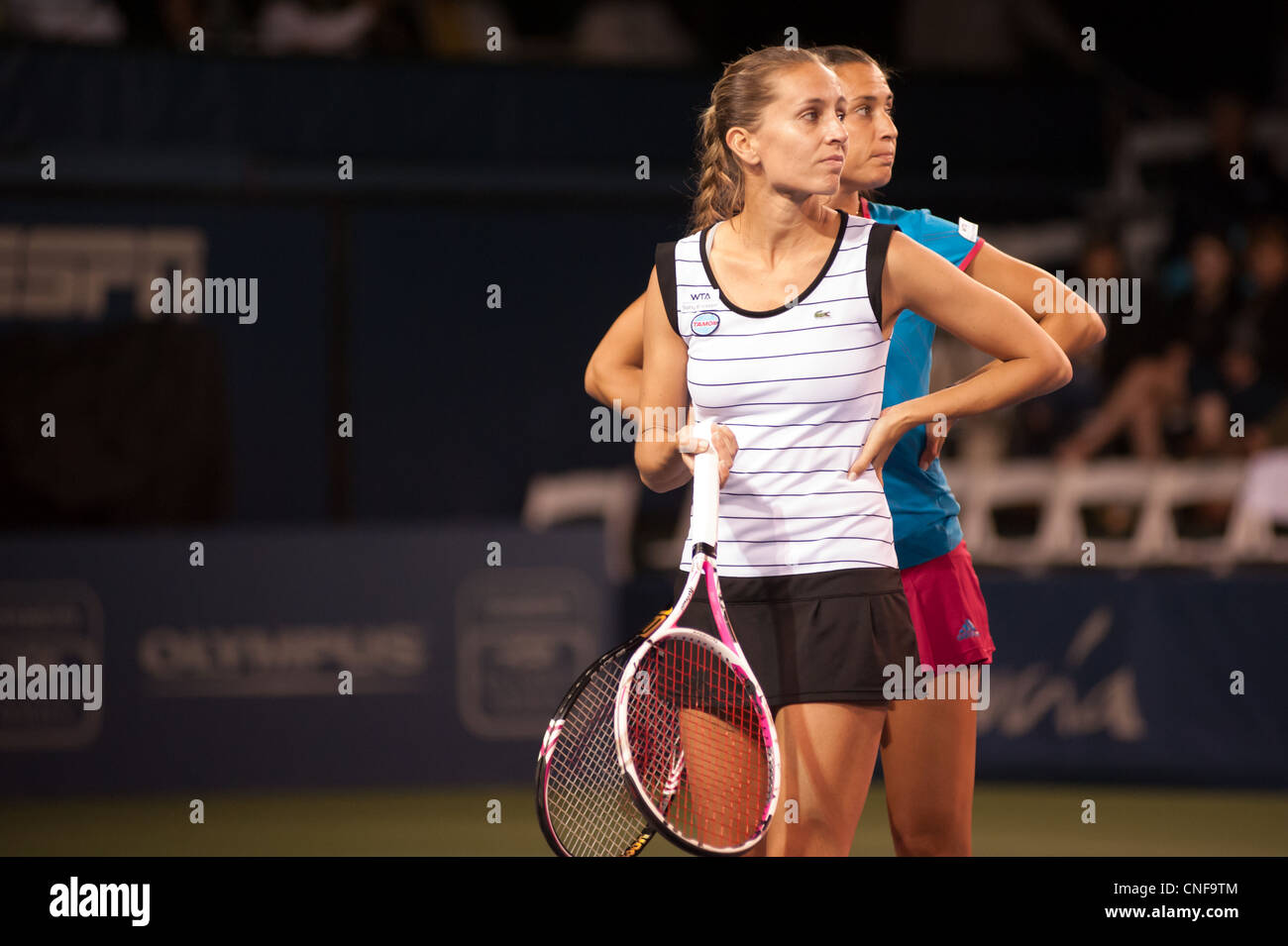Doubles partners, Flavia Pennetta and Gisela Dulko, on tennis court at La Costa Resort in Carlsbad, California. Stock Photo
