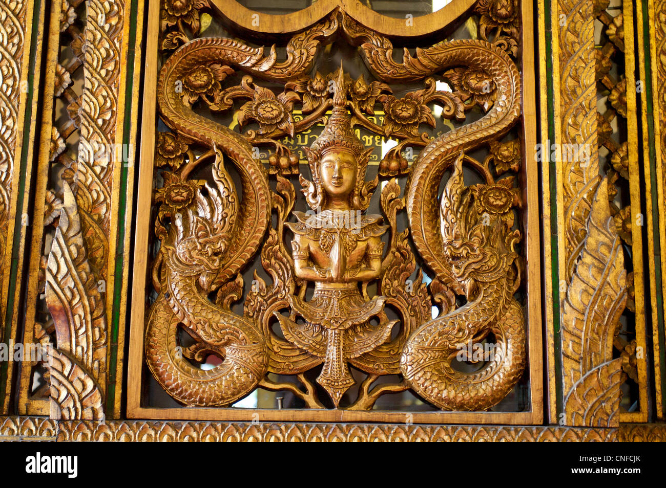 Thai art, Thai craving on window panel. Chiang Mai, Thailand Stock Photo