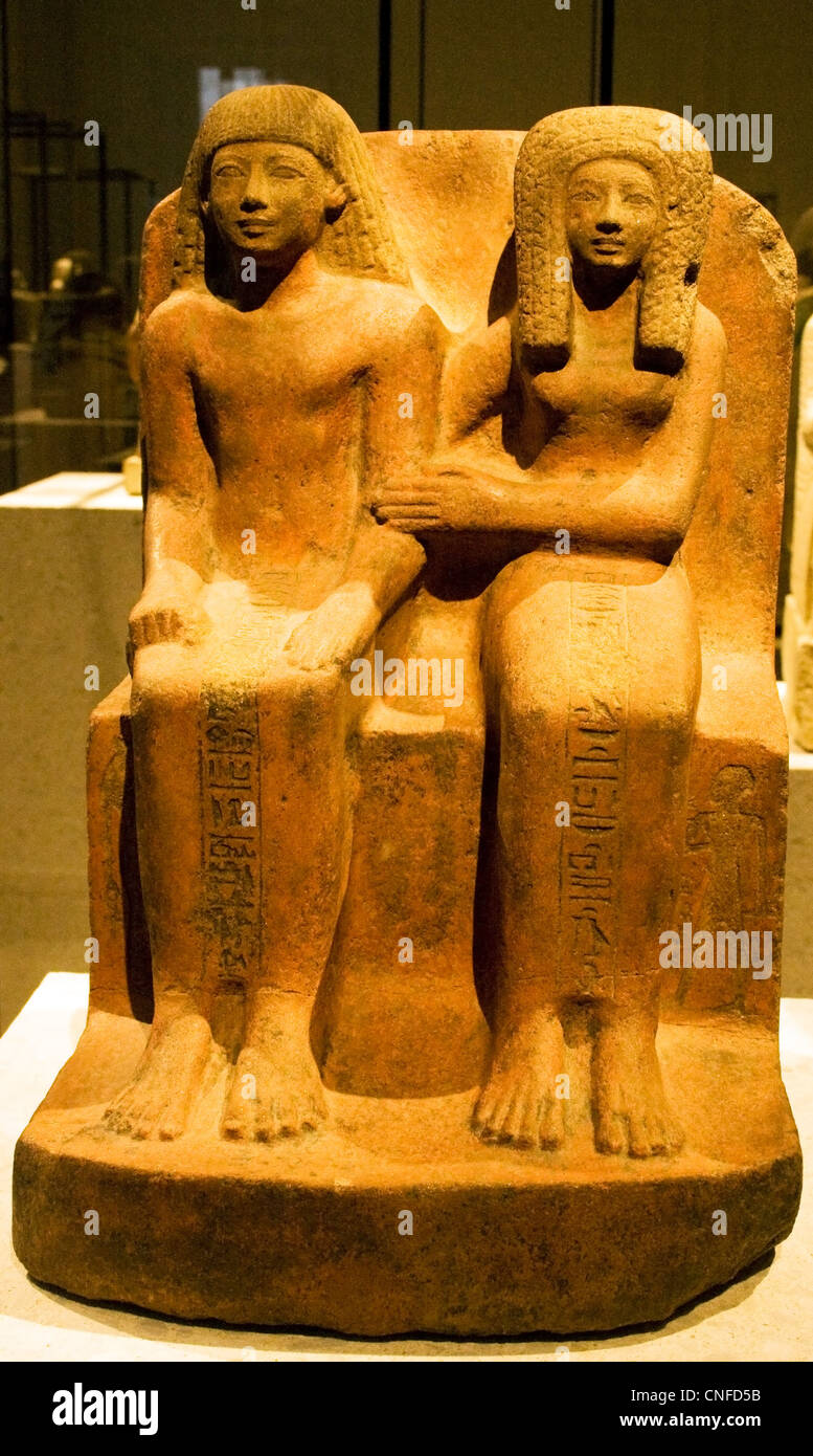 Seated figure of Amenhotep-user and his wife Tentwadj Stock Photo