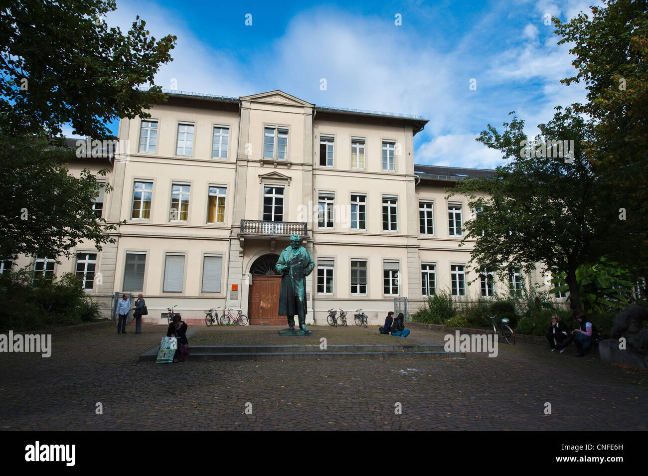 Statue of Robert Wilhelm Bunsen in front of the Anatomieplatz in Old Town Heidelberg, Germany. Stock Photo