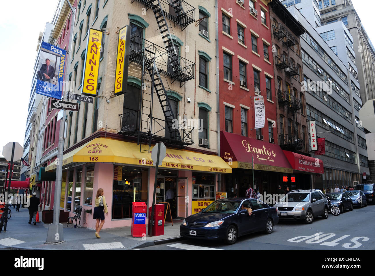 Buildings painted red beige bricks muti storey tenements rising william