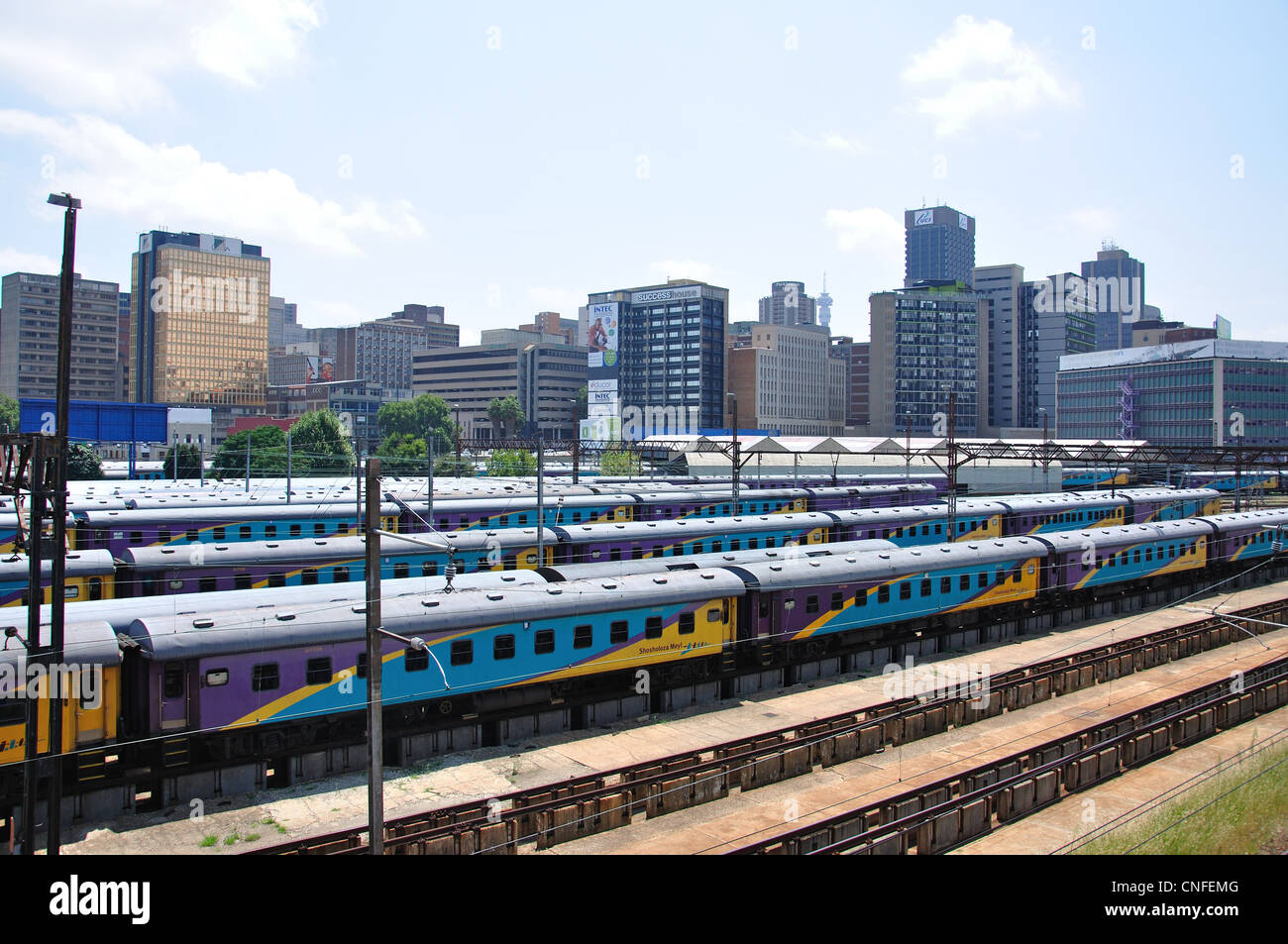 Shosholoza Meyl train carriages & city downtown from The Nelson Mandela Bridge, Johannesburg, Gauteng, Republic of South Africa Stock Photo