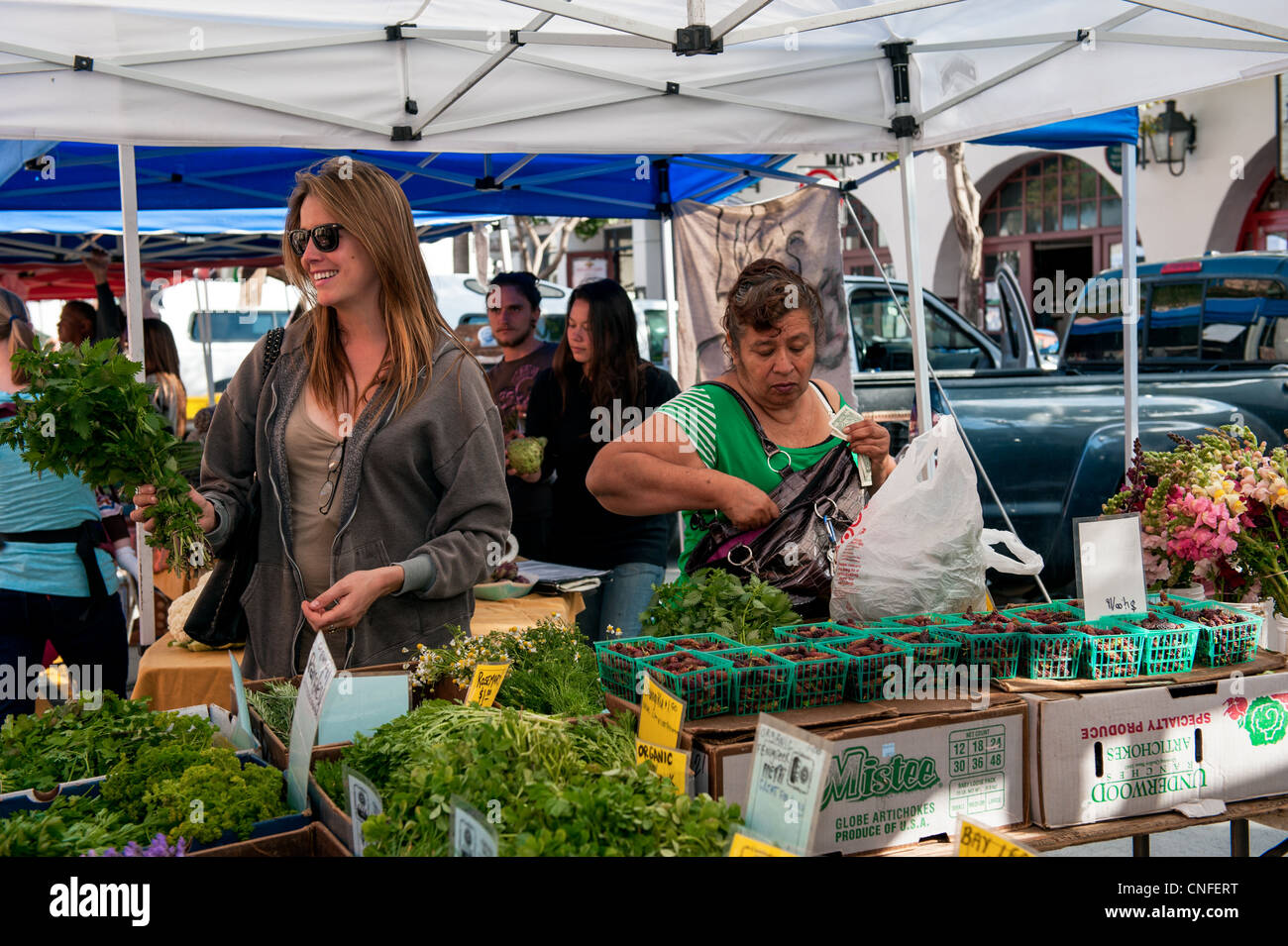 Buying and selling fresh organic produce at the Santa Barbara