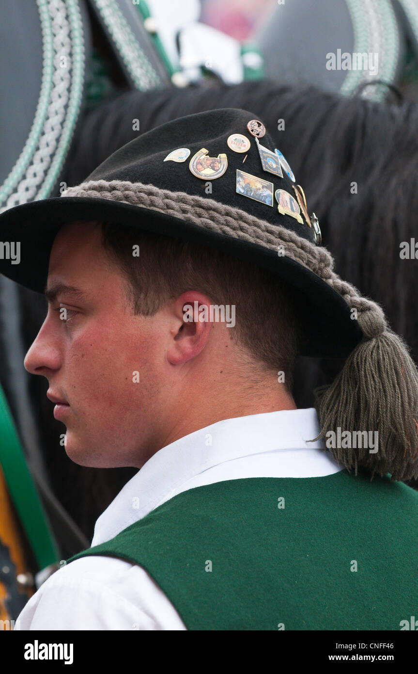 Man wearing a German hat with pins at the Stuttgart Beer Festival, Cannstatter Wasen, Stuttgart, Germany. Stock Photo