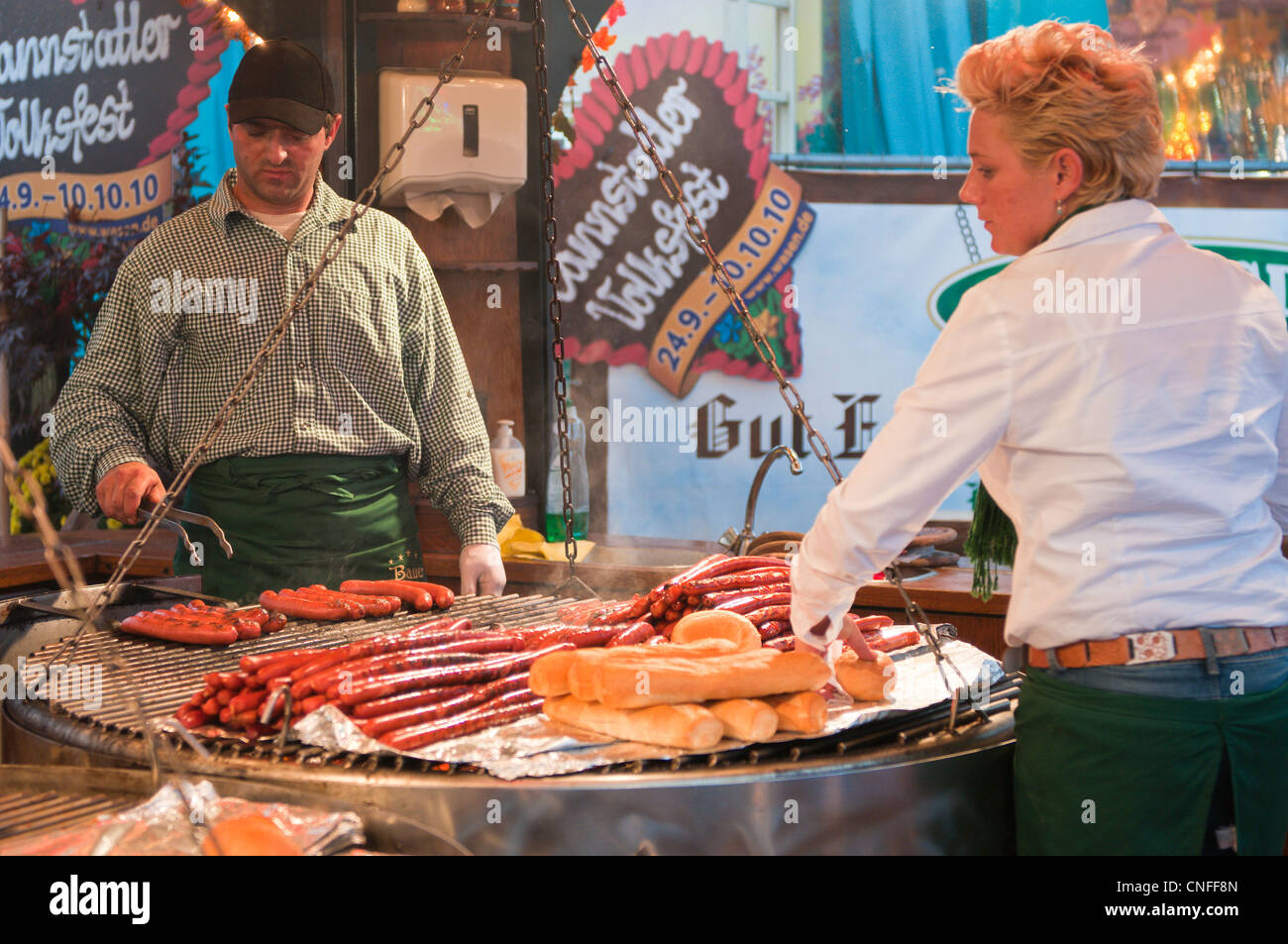 Barbecued meats at the Stuttgart Beer Festival, Cannstatter Wasen, Stuttgart, Germany. Stock Photo