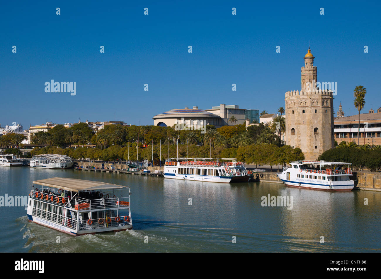Torre del Oro tower (13th century) by River Guadalquivir central Seville Andalusia Spain Stock Photo