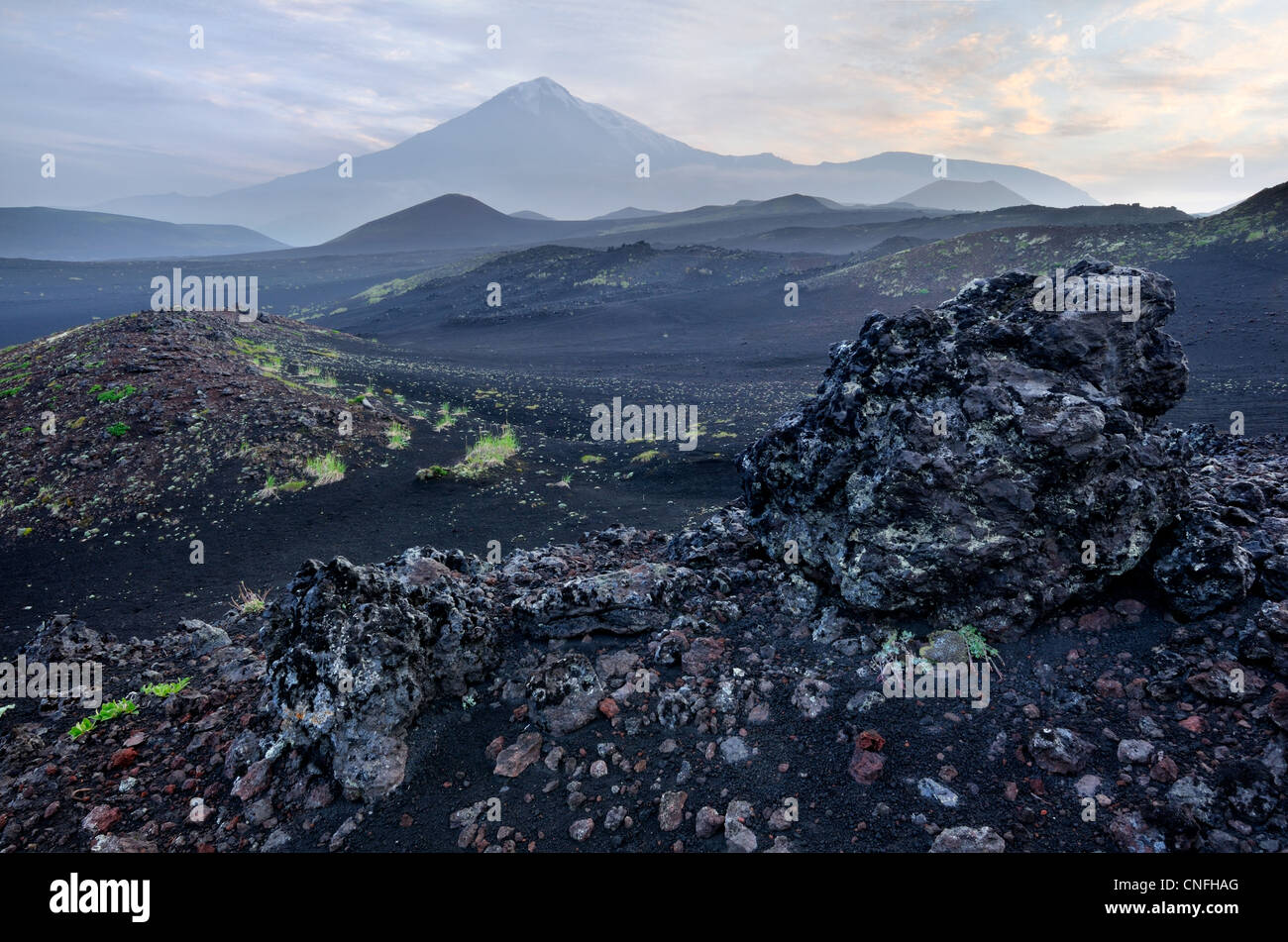 Lava field and Tolbachik Volcano, Kamchatka Peninsula, Russia Stock Photo