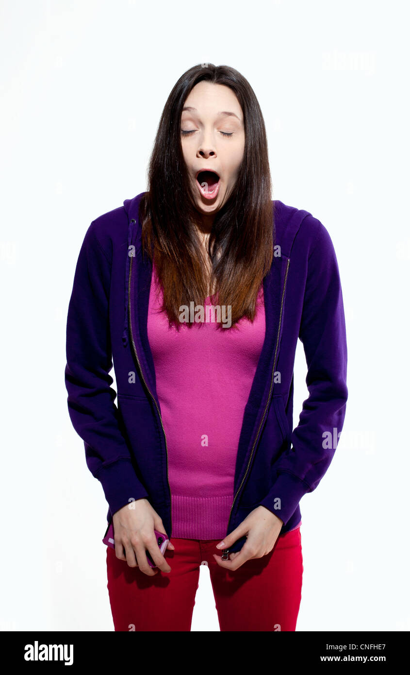 Young woman yawning Stock Photo