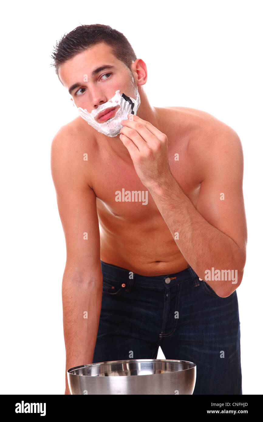 young man shaving Stock Photo