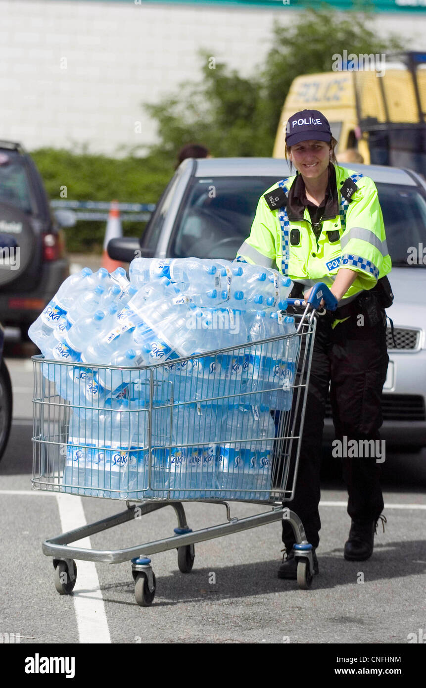 Flood victims residents of Gloucester collect emergency supplies of