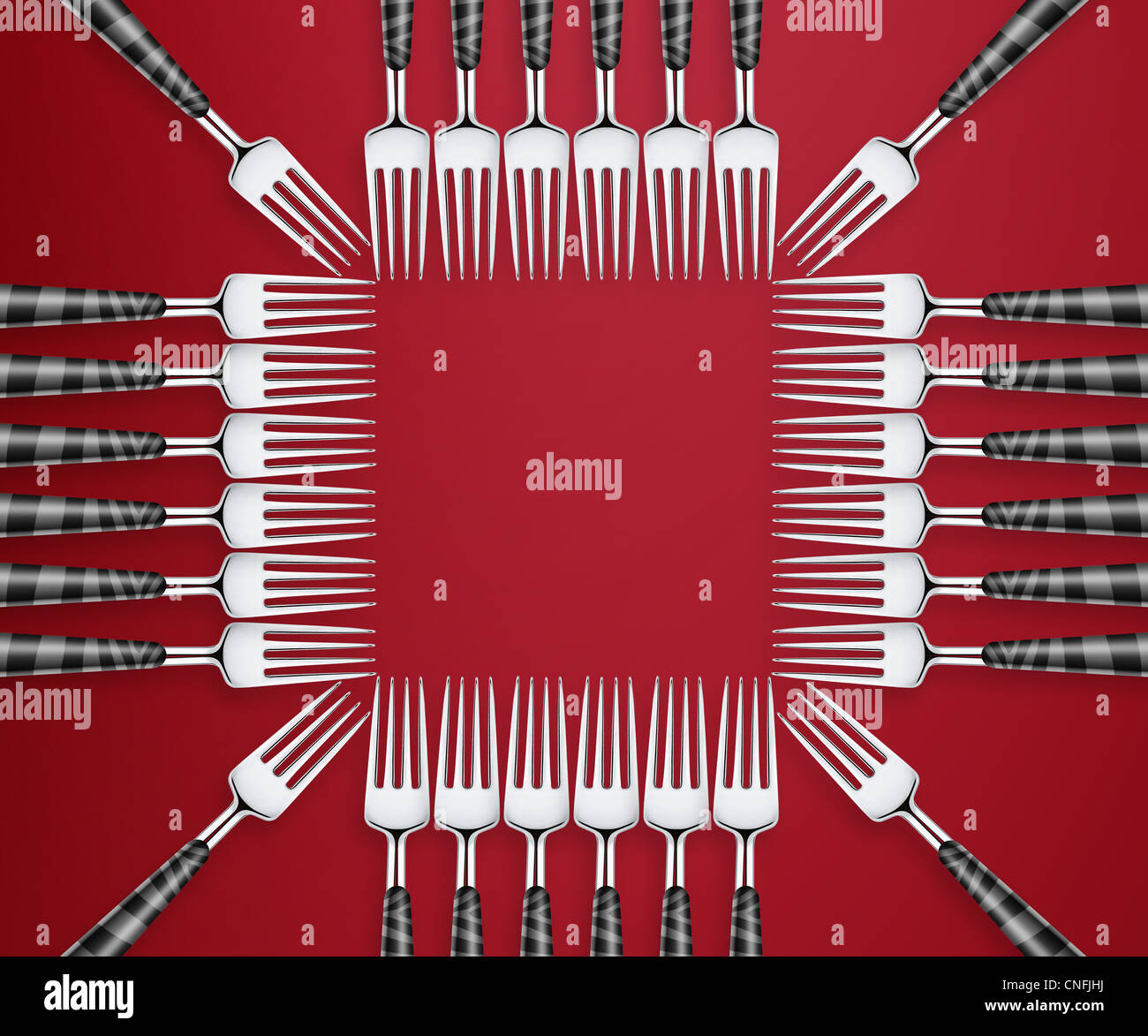 Empty copy space of Set of forks in competition on red background. Stock Photo