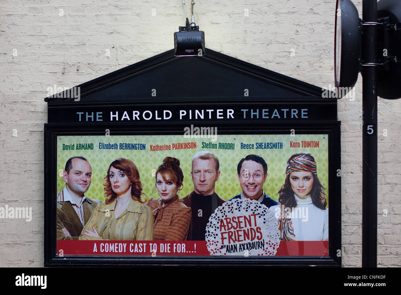 Poster Advertising The Harold Pinter Theatre  of the production of Absent Friends Stock Photo