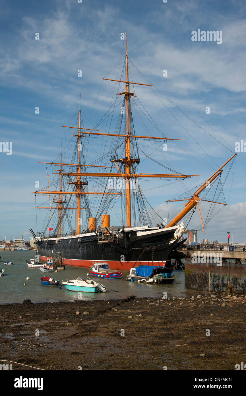 Portsmouth harbour looking towards HMS Warrior. The world's first ironclad warship Stock Photo