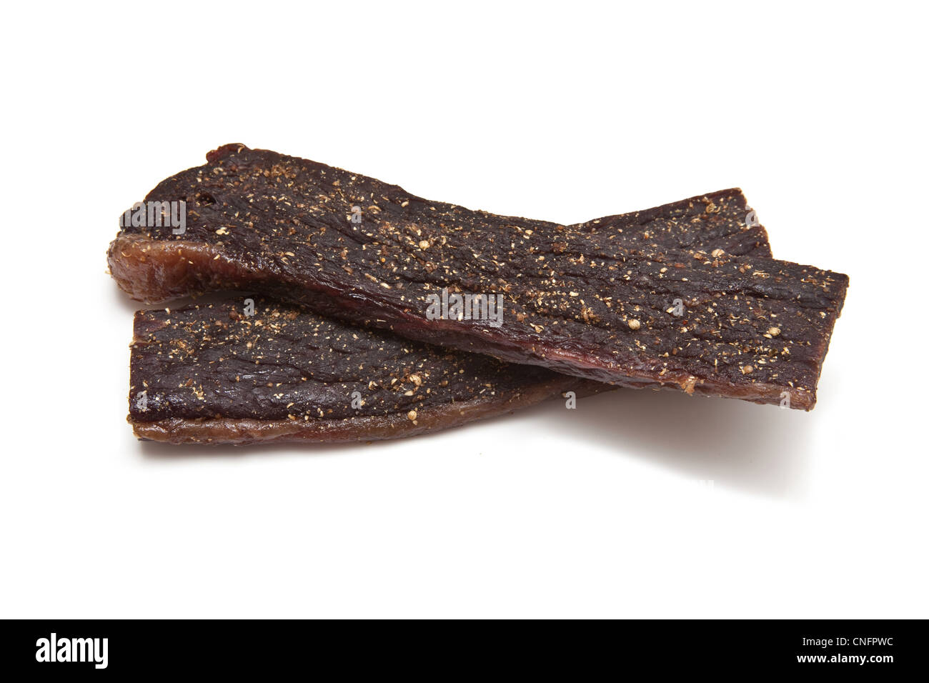 South African biltong (beef jerky) isolated on a white background Stock Photo
