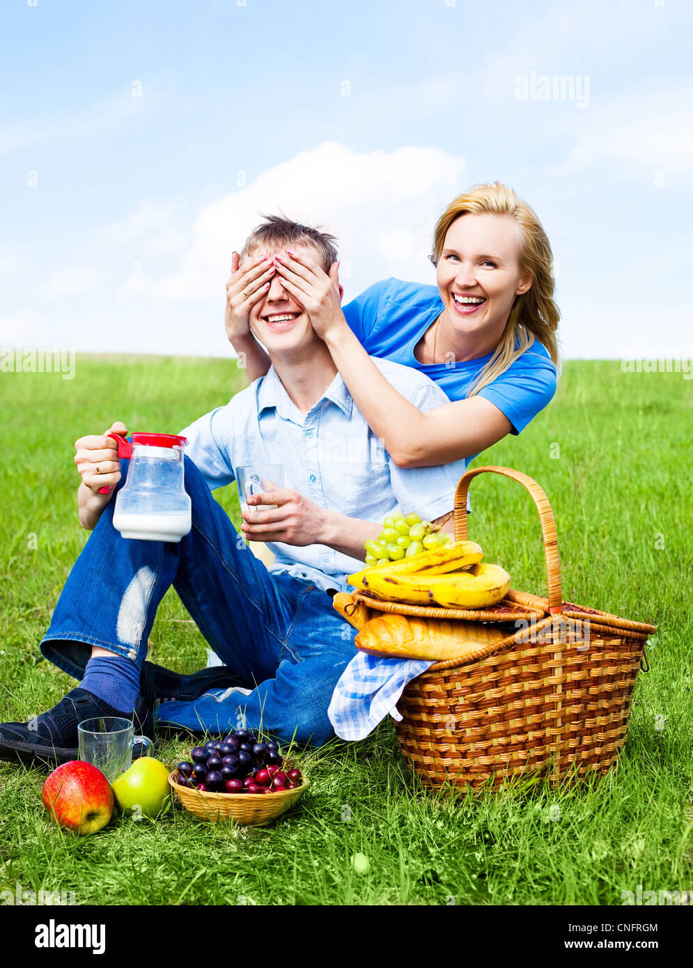 Family having a picnic on grass hi-res stock photography and images - Alamy