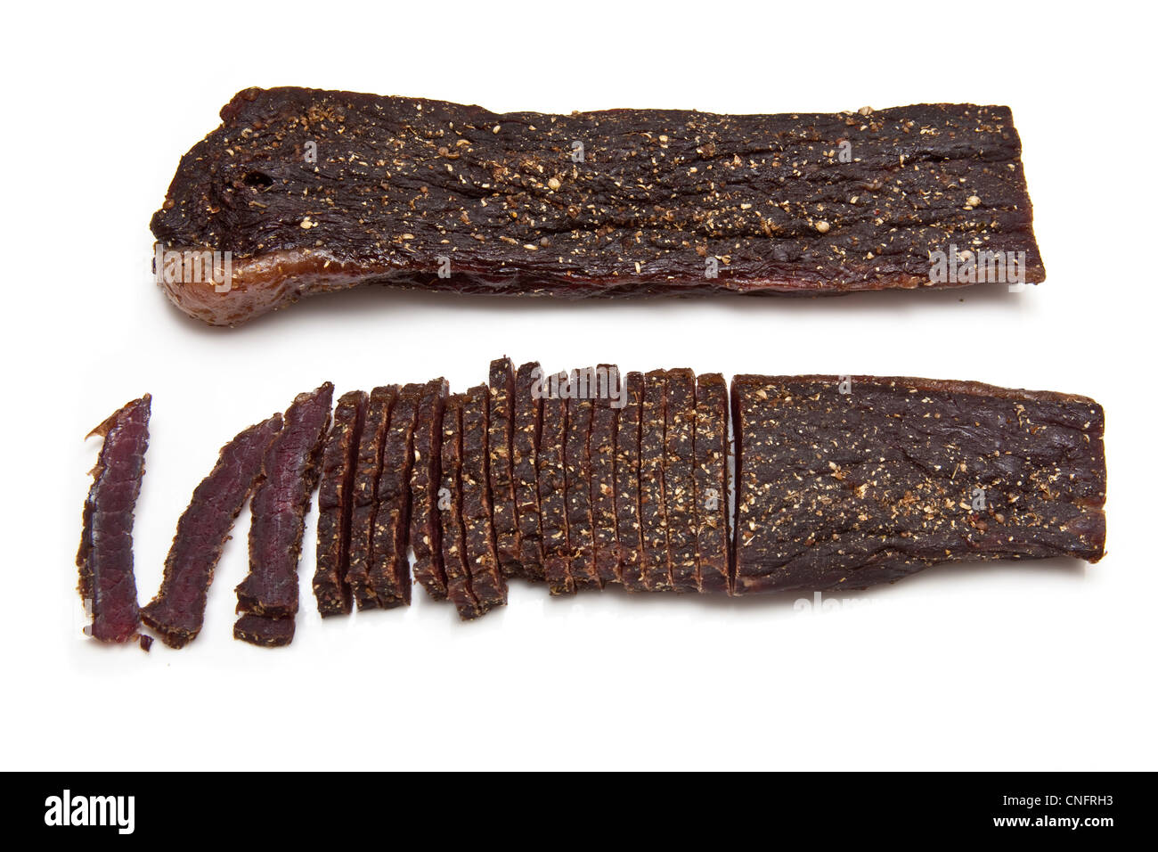 South African biltong (beef jerky) isolated on a white background Stock ...