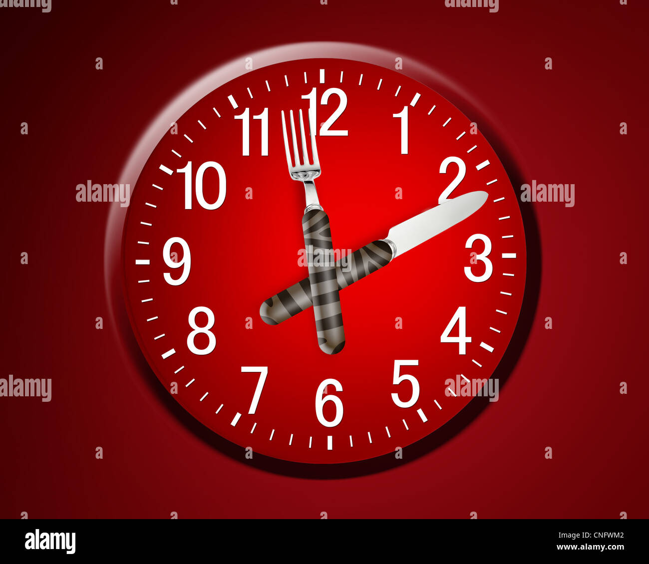 Lunch time concept, clock in plate, knife and fork Stock Photo - Alamy