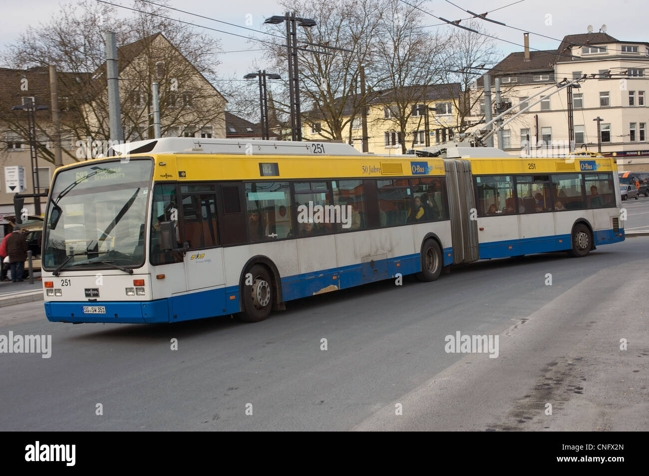 Electric bus powered from overhead wires Solingen Germany Stock Photo