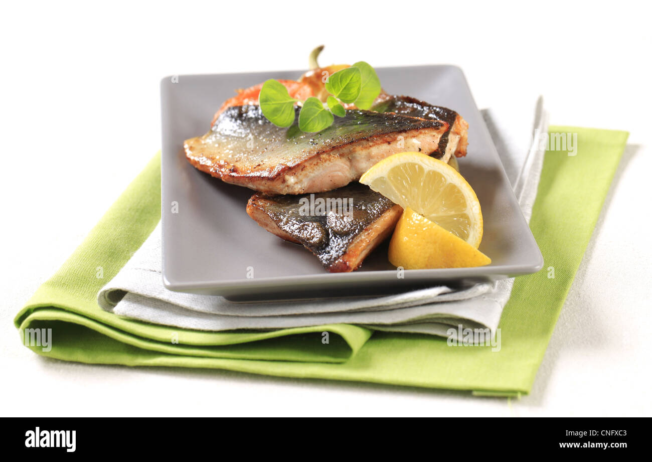 Pan fried trout fillets and vegetable garnish Stock Photo Alamy