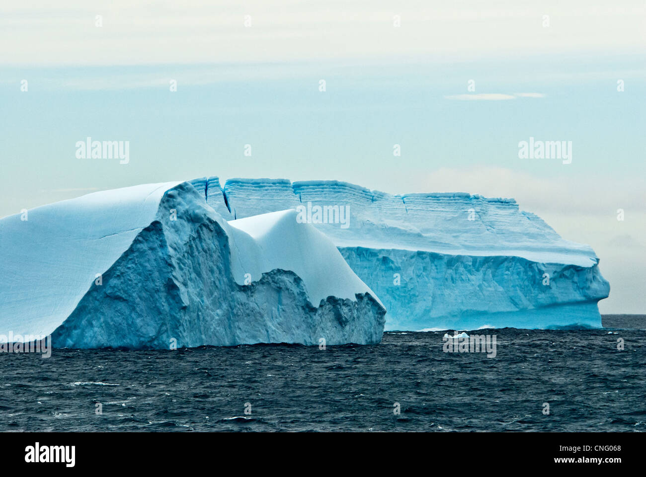 Piece of Antarctic ice-sheet floating off the coast of King George Island as an iceberg Stock Photo
