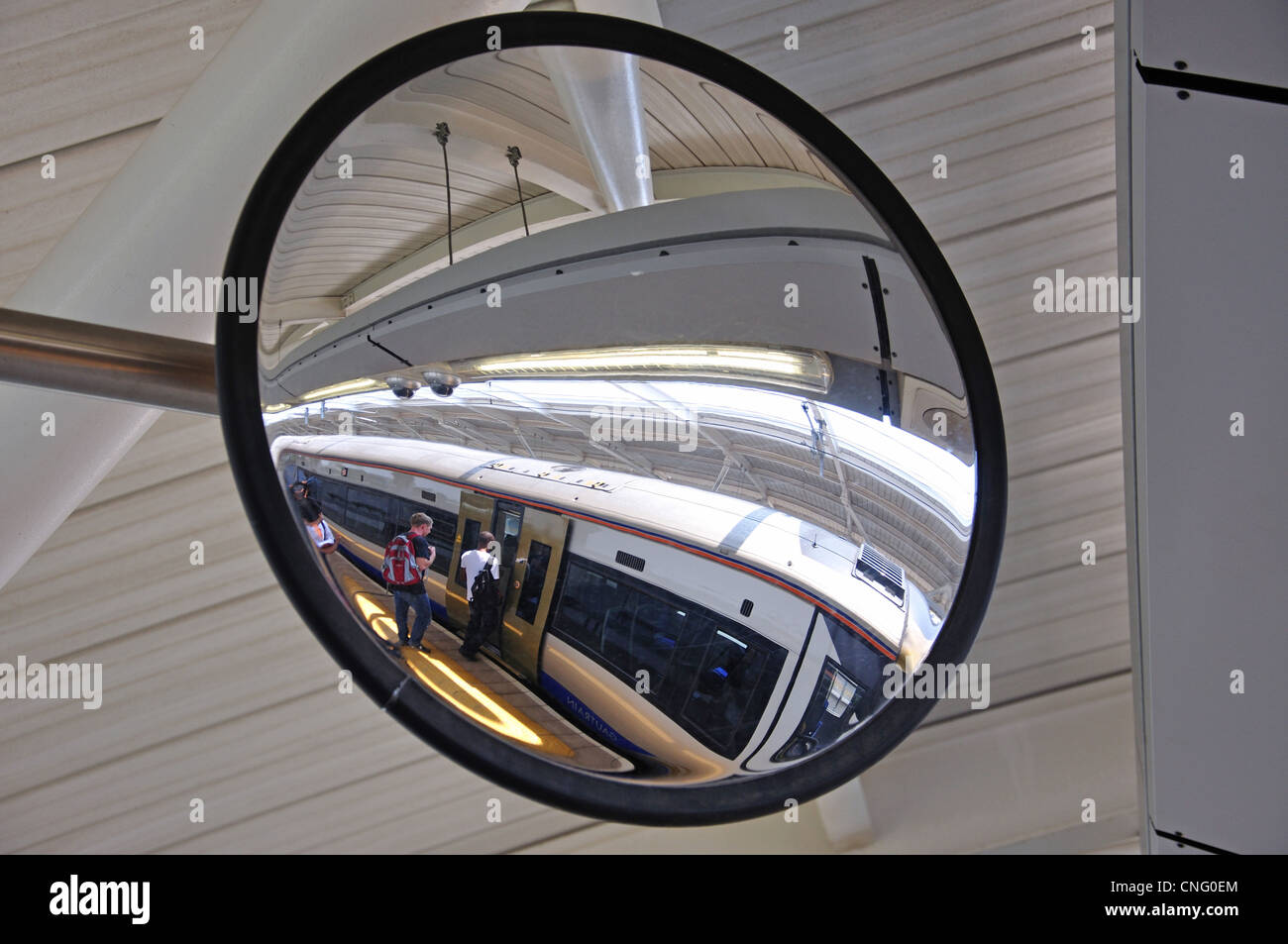 A convex mirror on platform at Rhodesfield Gautrain Station