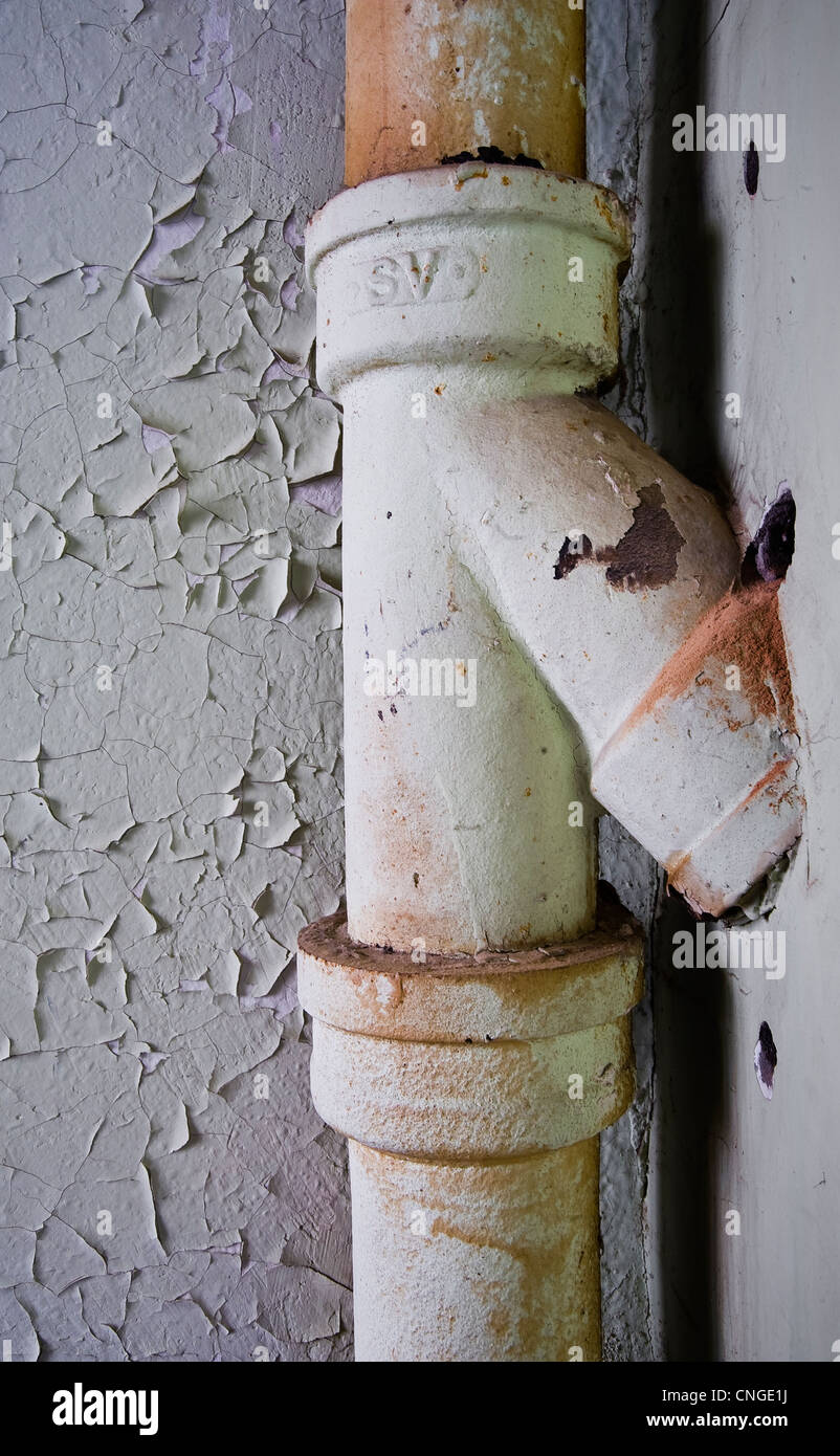 Old Rusty Pipe With Peeling Paint Stock Photo