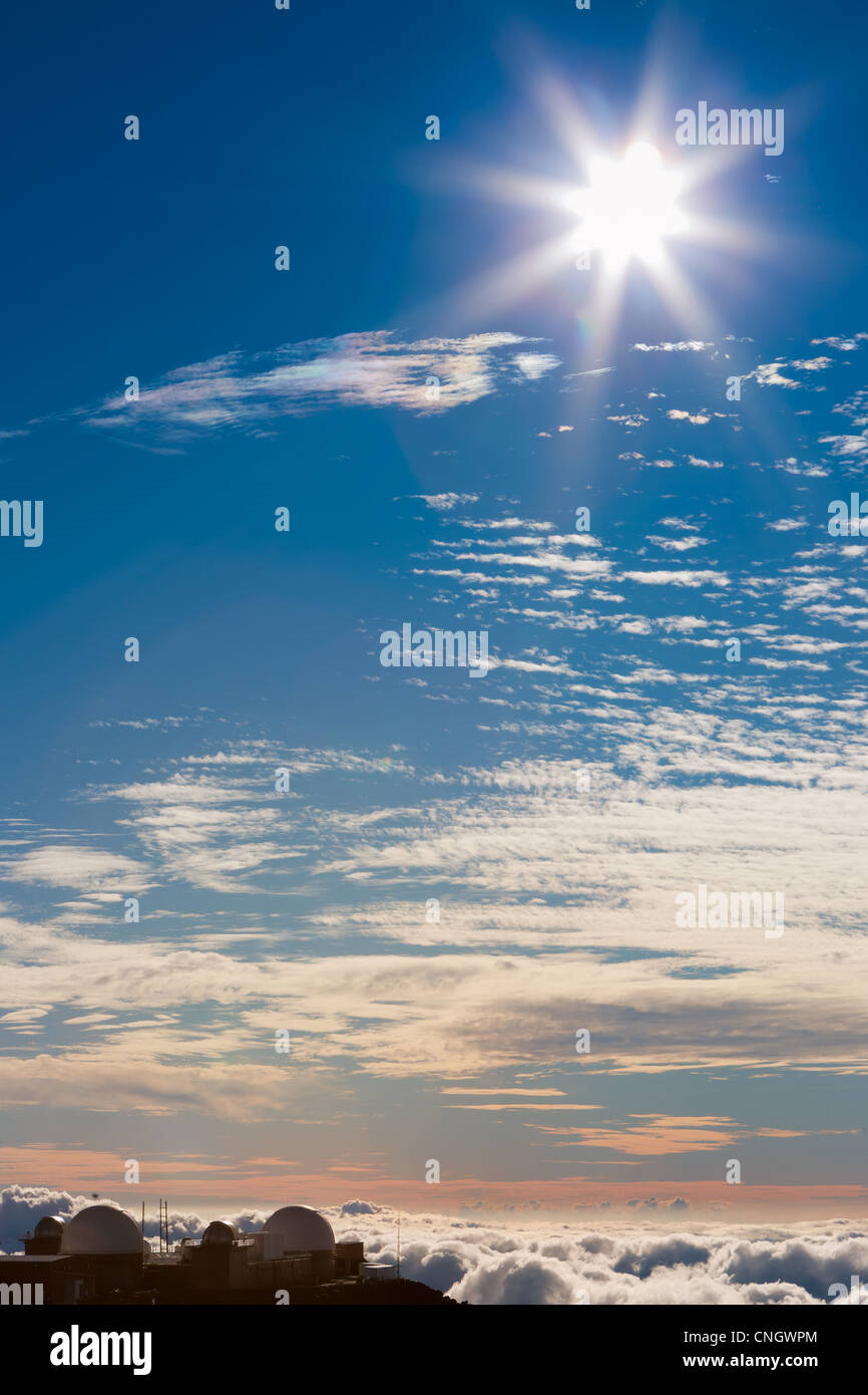 Sunset above the clouds over 3000 meters at the Haleakala Volcano, Maui