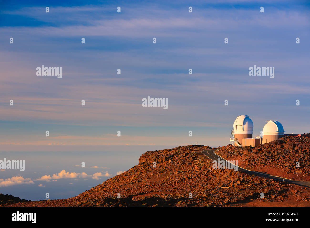 Sunset above the clouds over 3000 meters at the Haleakala Volcano, Maui